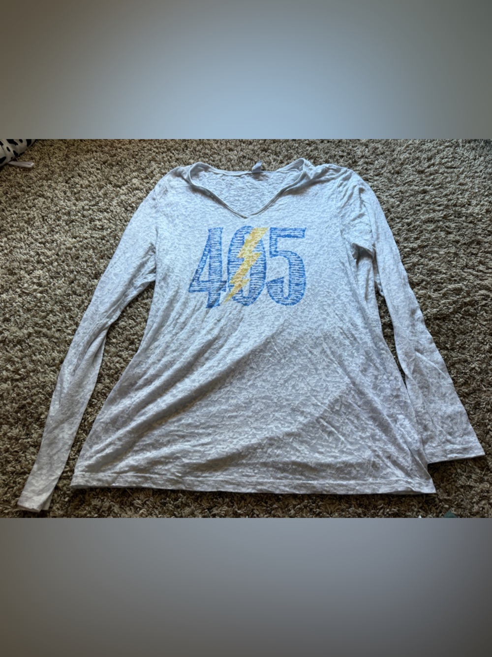 Kavio White Tee with Blue Logo and Green Accent 405 okc thunder
